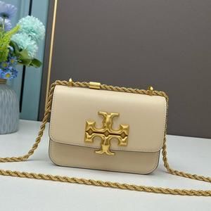 Barely handled, in near-new condition. Tory Burch